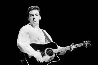 Bruce Springsteen plays acoustic guitar as he performs at Centrum - Old Photo 3