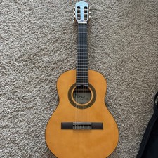 Cordoba C1 1/4 Classical Guitar Brown 6-String RH comes with a case