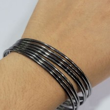 QVC Joan Rivers Set Of Seven Gunmetal Average Bangle Bracelets