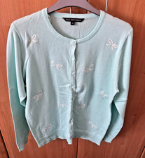 Mintgrüne Damenstrickjacke mit weißen Schle...
