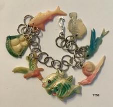 7 Lot Puffy Fish Flying Fish Snail Shark Ship Celluloid Charm  BRACELET