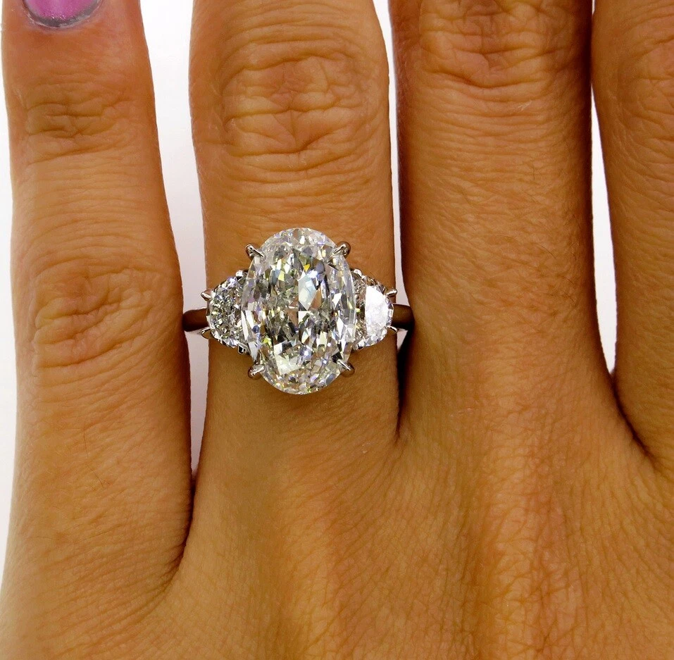 Oval engagement ring with half moon side stones online