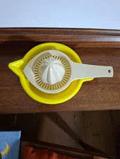 Juice Squeezers  Yellow and Beige Plastic