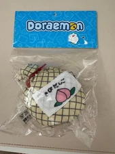 POP MART Fuxion Doraemon Plush Keychain (Momotaro Jirushi's Millet Dumplings）