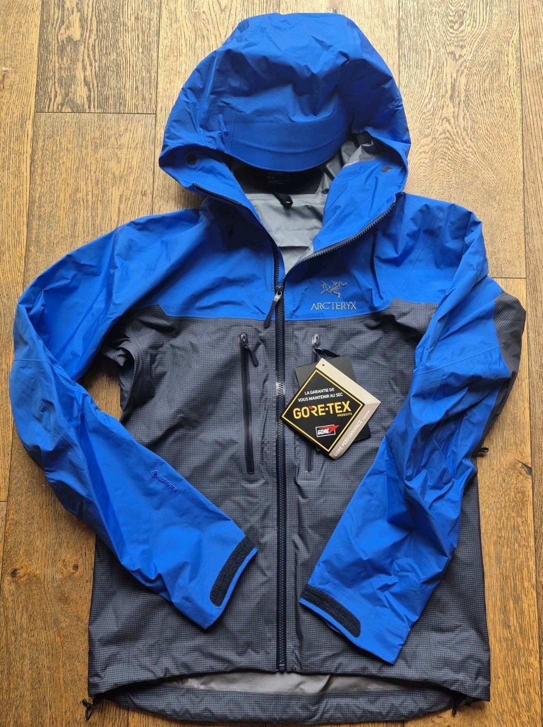 Giacca Arc'teryx Alpha blu e grigia uomo taglia media nuova con etichette