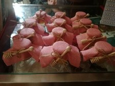 honey jar complete with wooden honey dosing favors