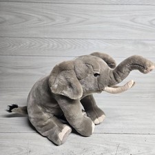 FAO Schwarz Elephant Plush Stuffed Animal Realistic Tusks Floppy Lying Down