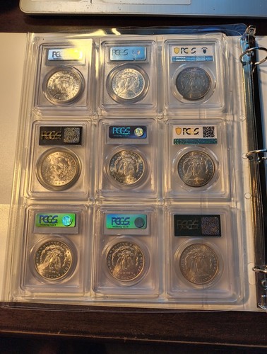 9 morgan silver dollars - all certified pcgs ms63 - in display case with binder - Picture 11 of 17