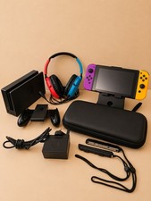 Nintendo Switch Console Bundle + Protective Case & Travel Stand – Good Condition