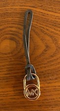 Michael Kors MK Handbag Charm/Key Fob Brown color leather and goldtone Locket