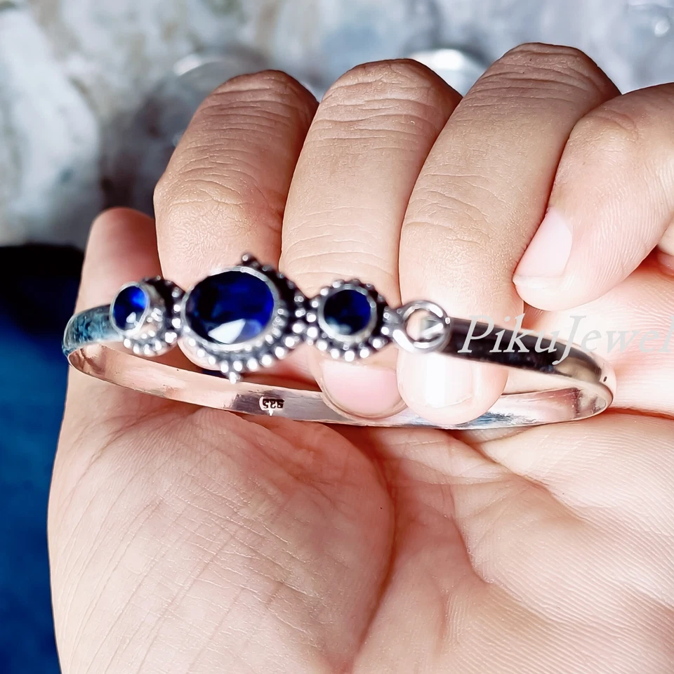 Brazalete brazalete grande de plata de ley 925 con piedras preciosas de talla múltiple de tanzanita azul Foto 3 de 4