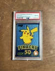 2000 Pokemon Japanese Meiji Promo Blue Foil Pikachu PSA 8 NM-MT