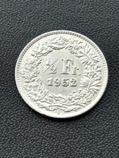 1952 Swiss 1/2 Franc- .8350 Silver + a free 1967 nickel. Lustrous.