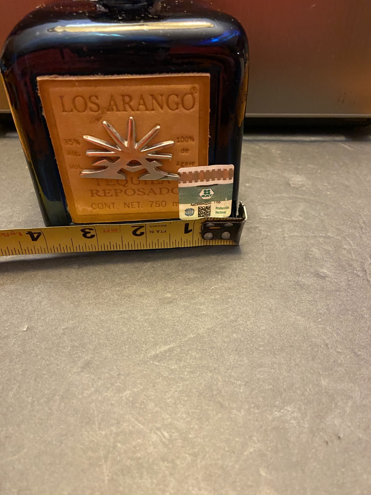 Los Arango special edition cobalt blue leather label tequila bottle