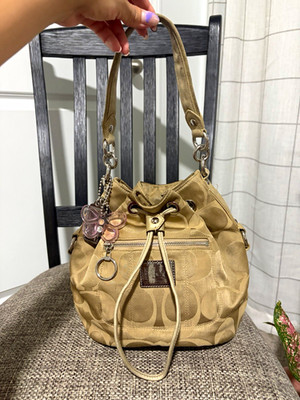 Coach Beige Logo Bucket Drawstring Bag Pink Lining Silver Hardware Charm