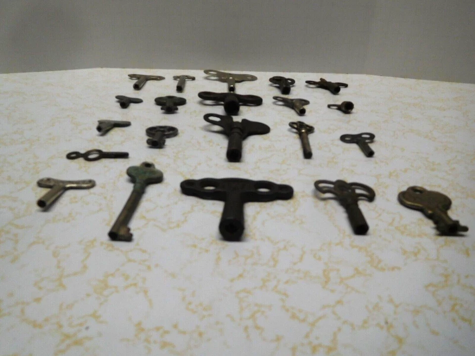 21 Antique/Vintage Hollow Barrel Clock & Winding Metal Keys - Image 3 of 4