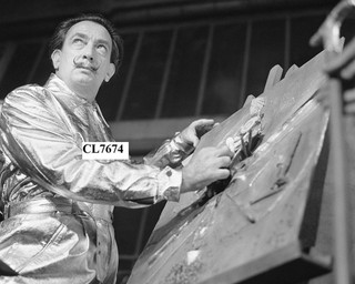 Salvador Dali Works on the Bronze Cover for Book The Apocalypse of St John Photo