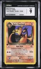 Pokemon CGC 9 Mint 1st Ed. Team Rocket Rare Dark Charizard 21/82