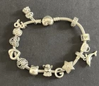 Pandora Sterling Silver Clasp  Bracelet and 14 Charms 21cm