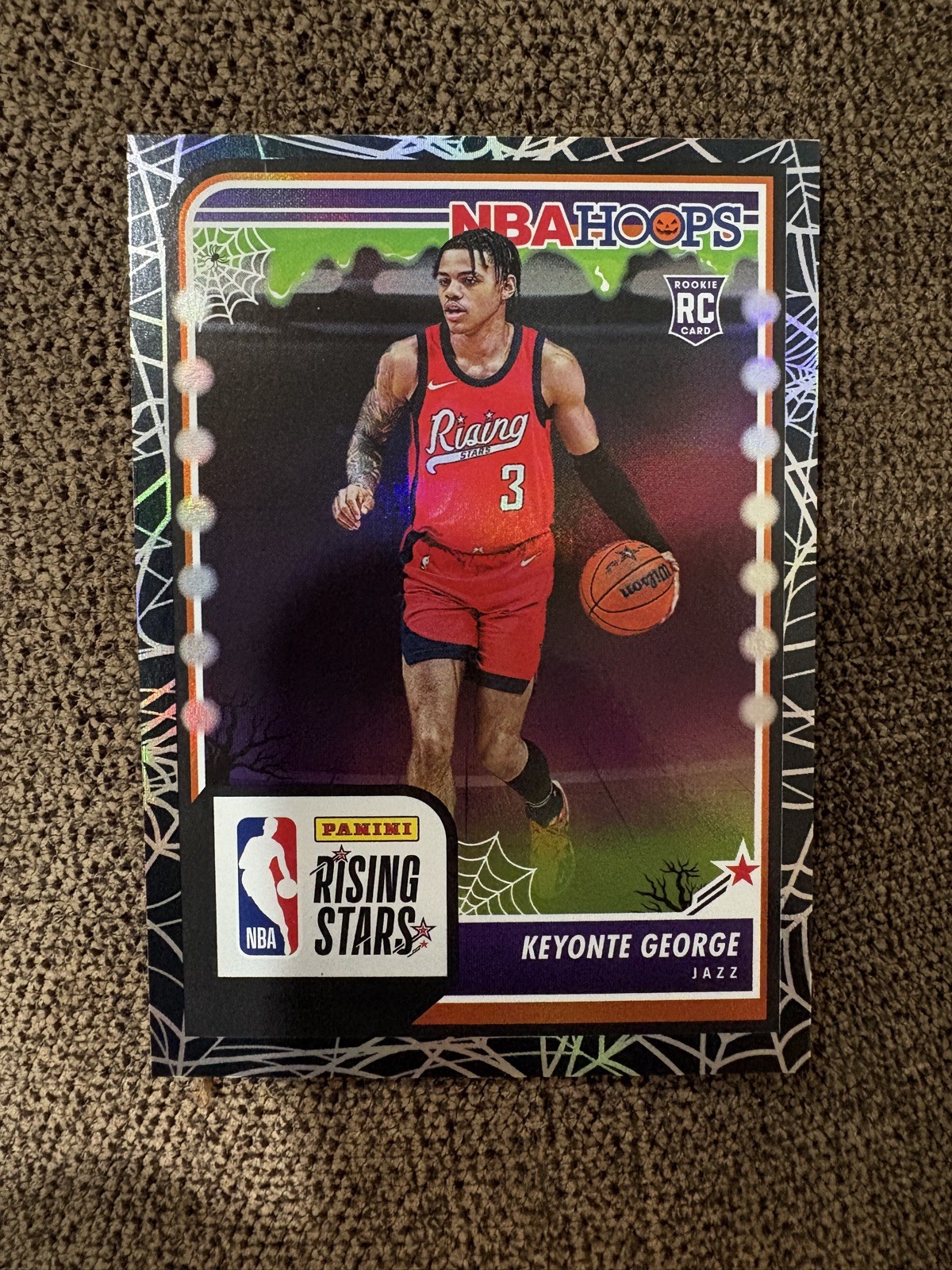 2023-24 Panini Haunted Hoops - Rising Stars Keyonte George Holo Black Web (RC)