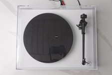 White Rega Planar 2 Turntable w/ Glass Platter. Rega Mini Fono Preamplifier