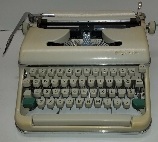 VINTAGE OLYMPIA TYPEWRITER with original case nice condition. tested eBay