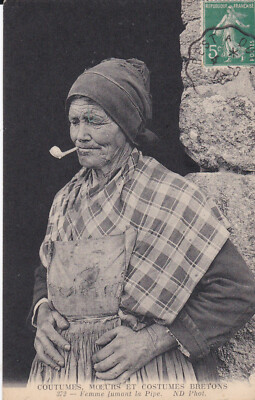 Old postcard woman smoking the pipe