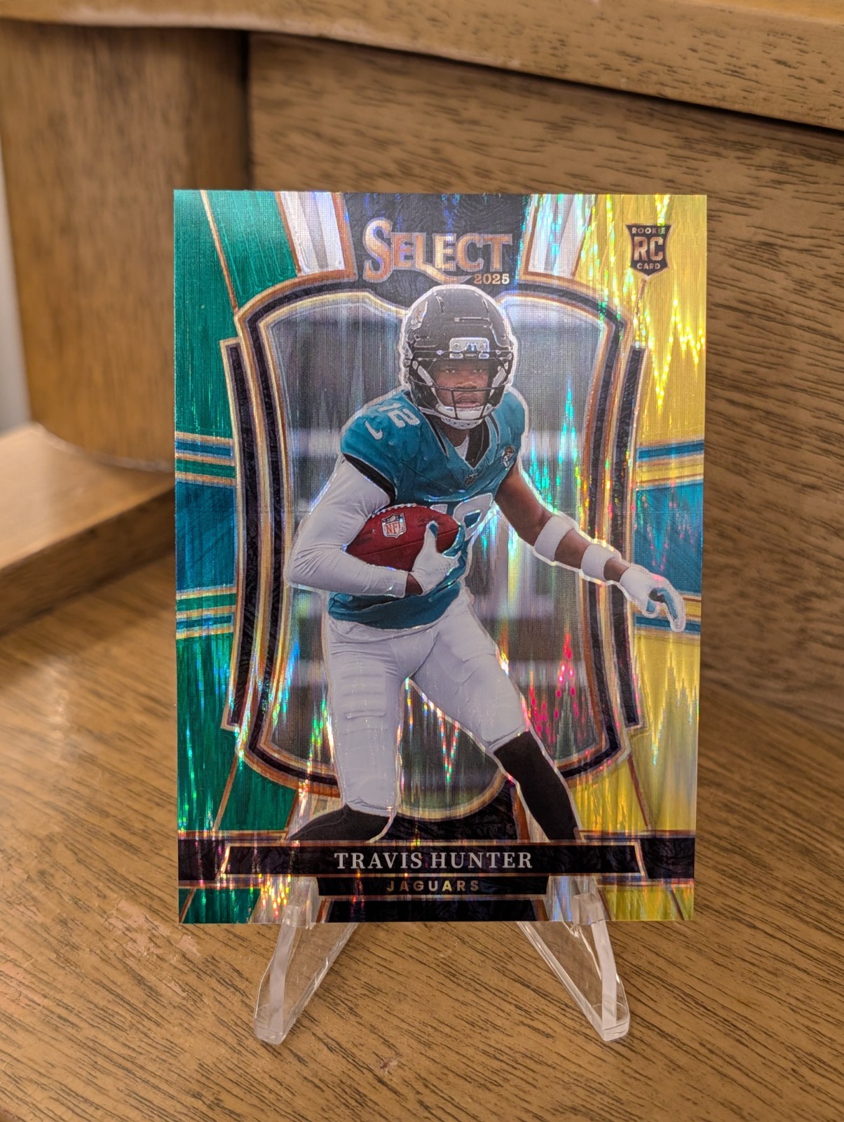 2025 Panini Select Travis Hunter Green and Yellow Shock Prizm Premier Level #128