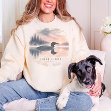 First Light Common Loon Floating on a Misty Lake Sweatshirt