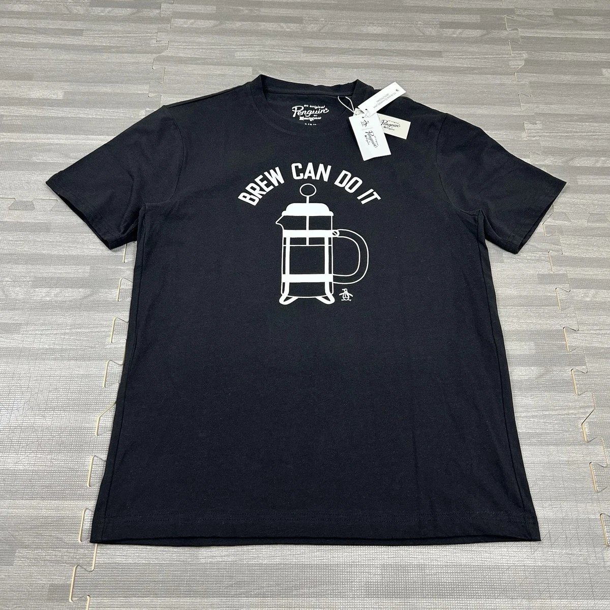 Conception de t-shirt graphique de dessin animé mignon de pingouin. Illustration vectorielle