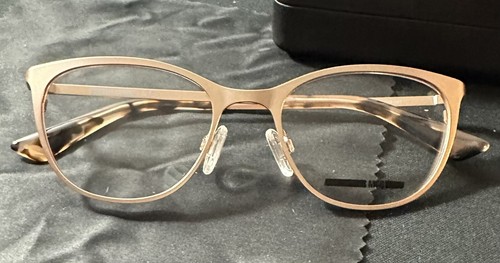 Anteojos y estuche Alexander Mcqueen McQ modelo MQ0295OP 003 oro mate - Imagen 3 de 11