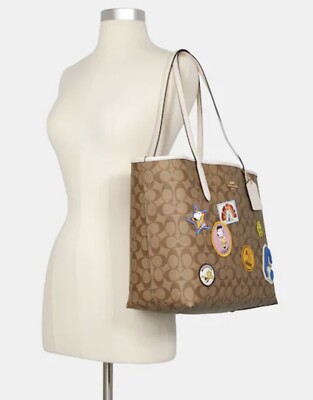 Coach X Peanuts City Tote In Signature Canvas Leather With