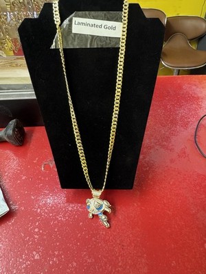 Gold Plated Chain With Power Poff Pendant