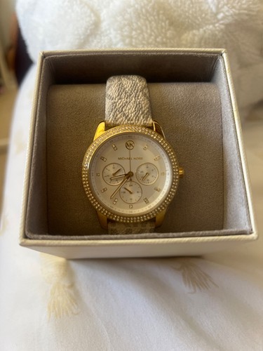 Michael Kors watch with leather band, never worn, still has box and papers