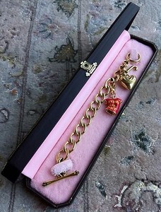 Authentic Authentic “Juicy Couture” Gold Plated Charm Bracelet In Original Box (7”, 65g)