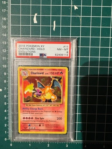 Charizard Holo 11/108 Evolutions Pokemon PSA 8
