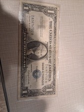 1957A $1 Silver Certificate Blue Seal Banknote I82674732A Circulated