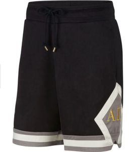 black and gold jordan shorts