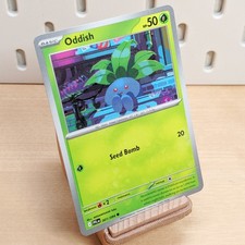 Oddish (Cosmos Holo) 001/094 ME02: Phantasmal Flames Common Pokemon Card