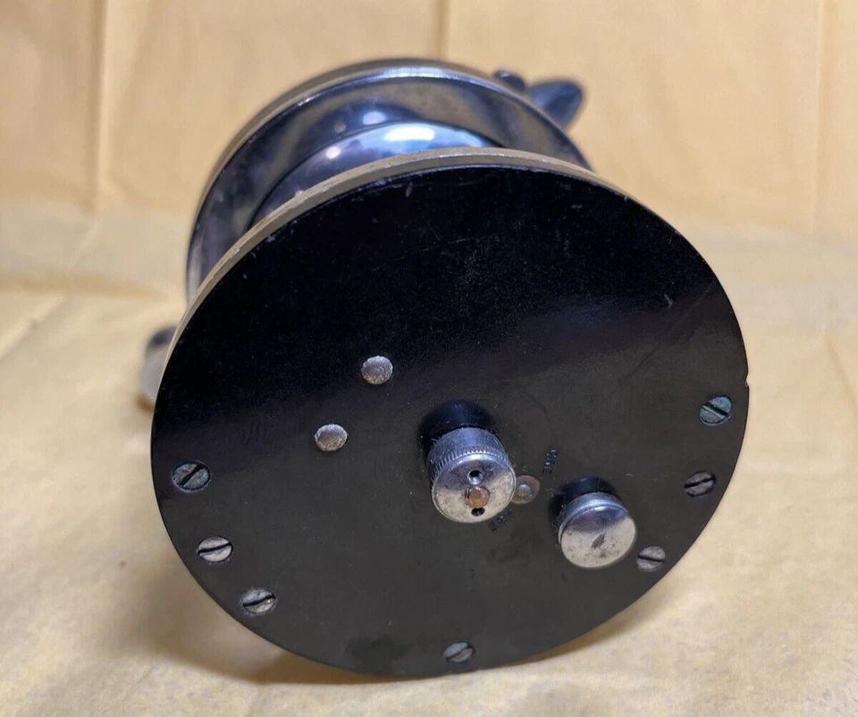 Carrete de pesca Ocean City Bay City 250 convencional arrastre de estrellas mármol mango negro Foto 3 de 4