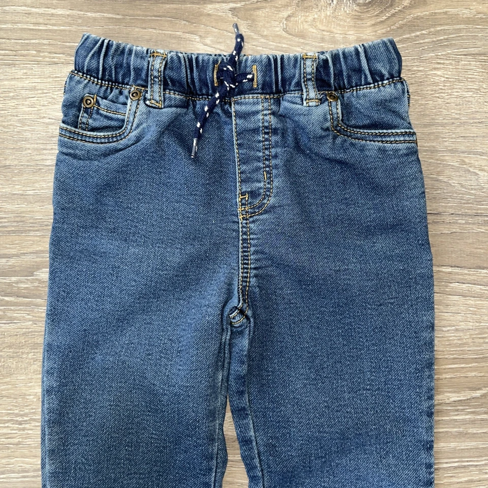 Pantalones de mezclilla Carters para niños niñas 6 bolsillos elásticos con cordón azul lavado medio  Foto 4 de 4