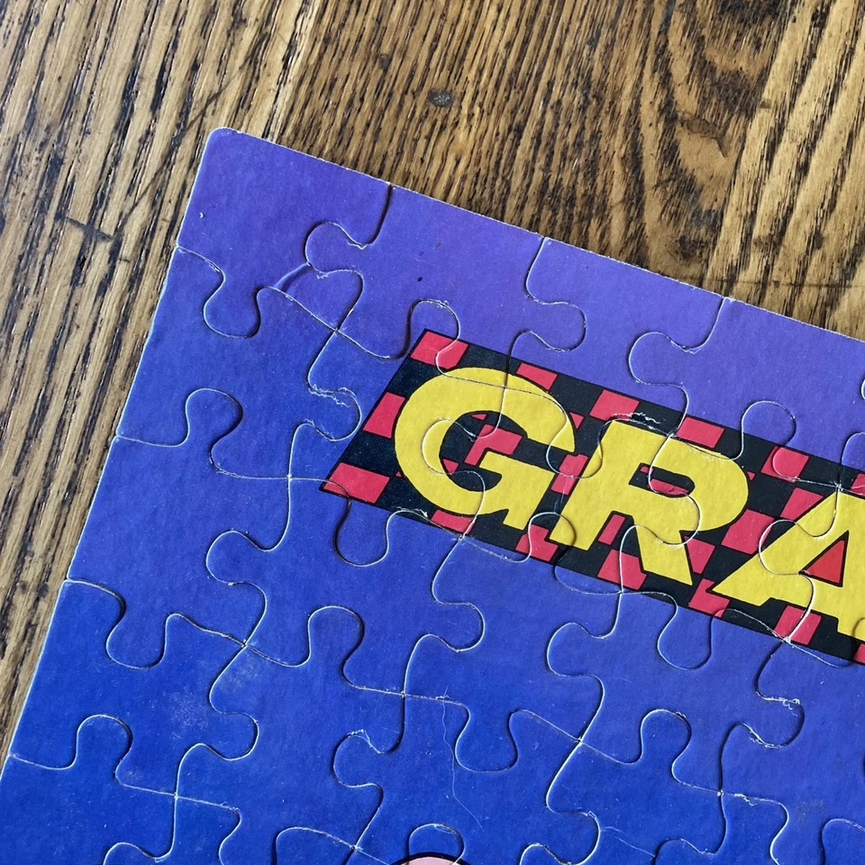 MB Puzzle Grand Prix 100 PIEZAS Personajes de Cacahuete 1966 Shultz 1975 De Colección Foto 3 de 4