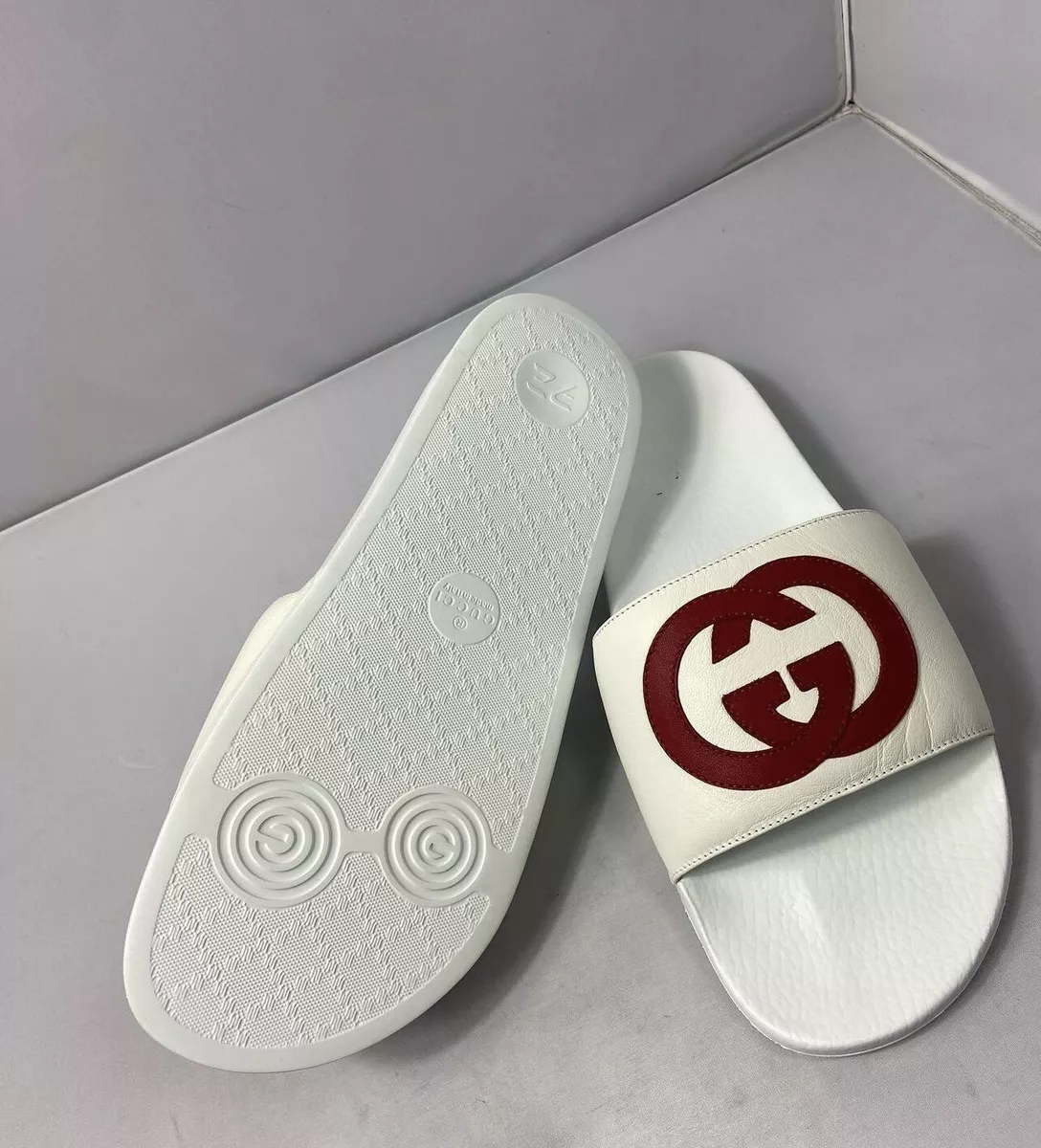 Shop Gucci Pursuit GG Logo Slide Sandals