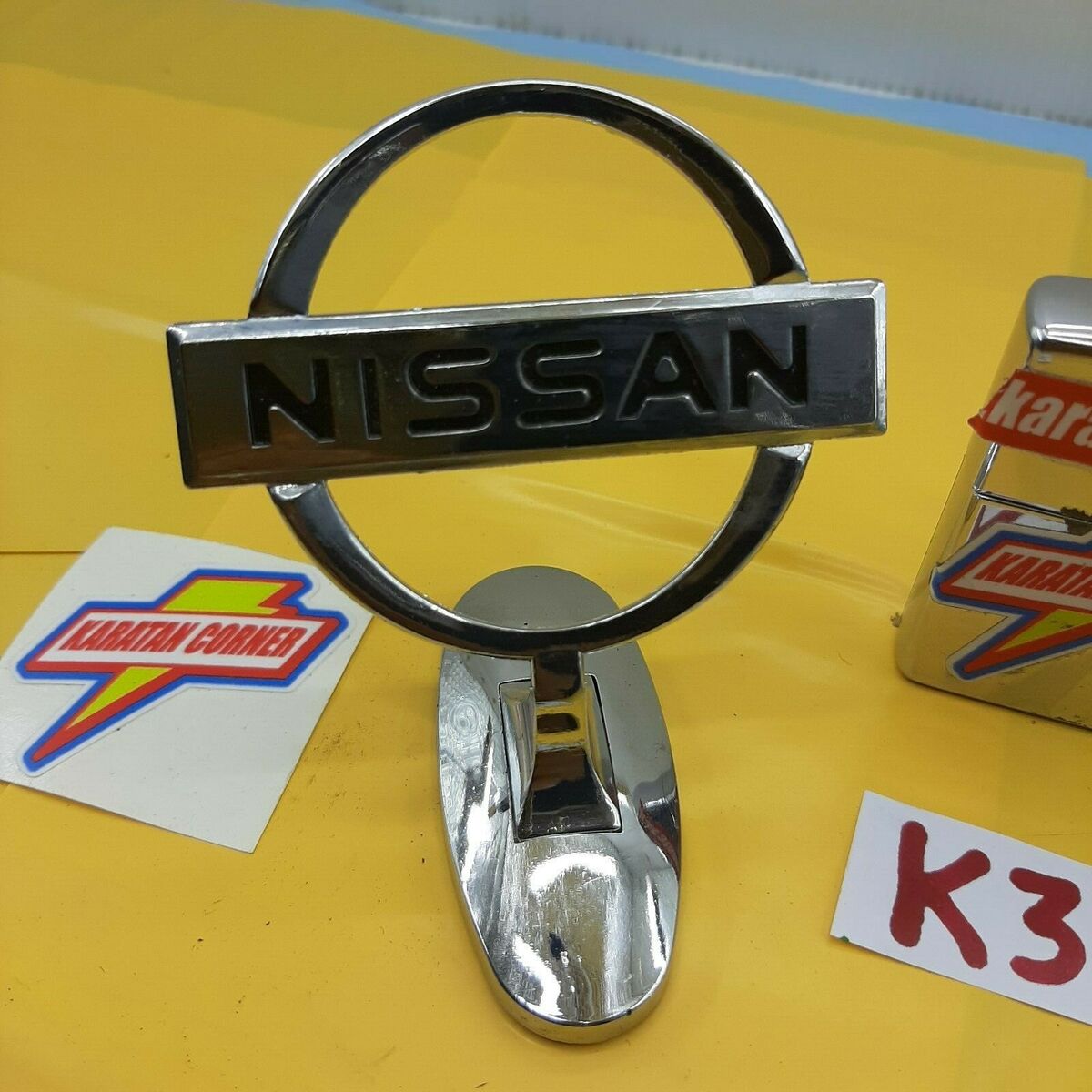 Hood ornament - FITS FOR NISSAN VINTAGE Material BRASS or Hood ornament - FITS FOR NISSAN VINTAGE Material BRASS or
