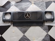 Kühlergrill Mercedes G Klasse W463 incl. Schweinwerferabdeckungen ***TOP-Zustand