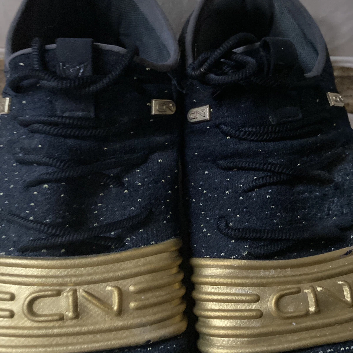 Cam newton gold 2024 under armour cleats