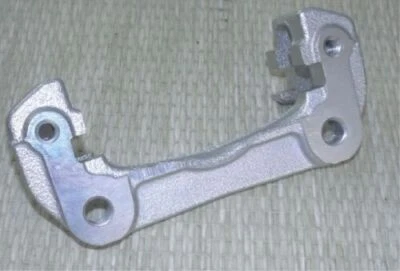 1x Neu Original Suzuki Jimny Bremssattel Vorne Pad Träger 55161-80000 - Bild 1 von 2
