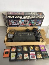 Atari 2600 CX-2600A Wood Grain 4 Switch Conso...