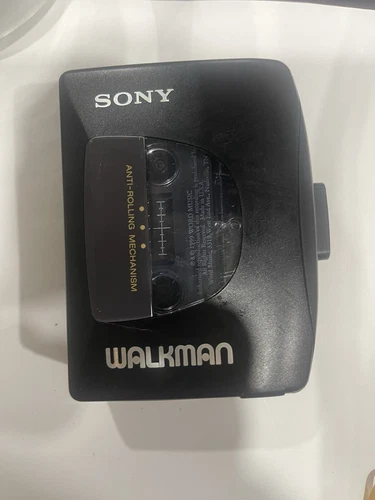 Sony Walkman Cassette Player WM-EX10 with MDR-006 Headset