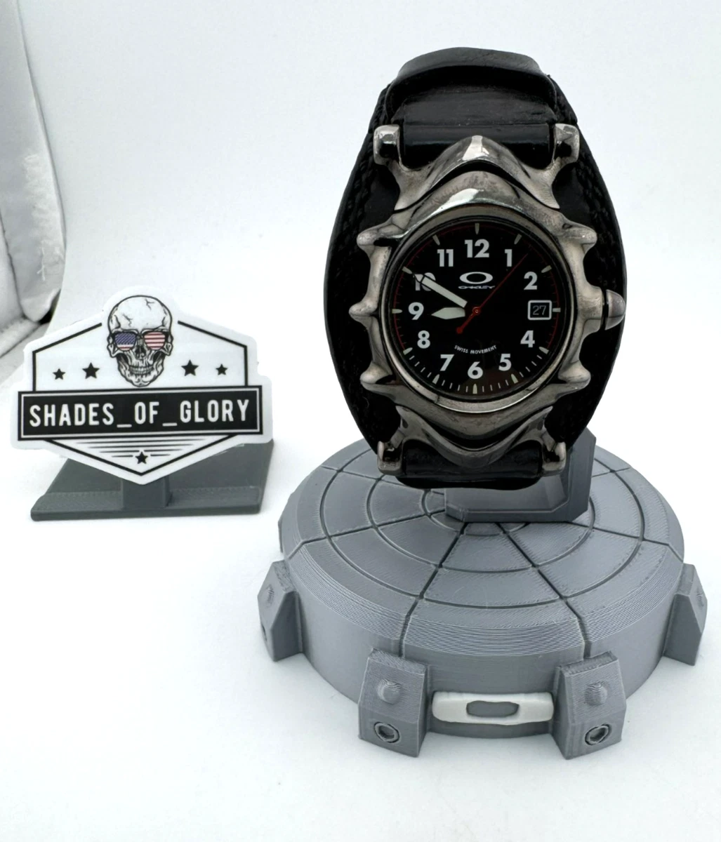 OAKLEY SADDLEBACK WATCH STEALTH BLACK & HONED DIAL W/ LEATHER 